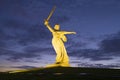 Motherland Calls monument in yellow night illumination. Volgograd