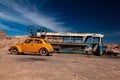 Volkswagen beetle oldtimer classic car and abbandoned bus