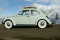Volkswagen Beetle side view with trunk lid open Royalty Free Stock Photo