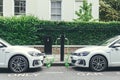 Volkswagen Golf GTE charging at a charging point on a street in London Royalty Free Stock Photo