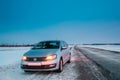 Volkswagen Polo Car Sedan Vento Parking On A Roadside Of Country Road On A Background Of Dramatic Sunset Sky At Winter Royalty Free Stock Photo