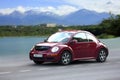 Volkswagen small red car. Royalty Free Stock Photo