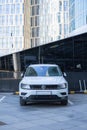 Volkswagen Tiguan SUV car parked in urban landscape, frontal view