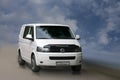 Volkswagen Transporter white minibus.