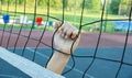 Volleyball boy`s hand holding a volleyball net Royalty Free Stock Photo