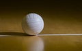 Volleyball court wooden floor with ball on black with copy-space Royalty Free Stock Photo