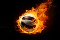 A volleyball engulfed in flames stands out against a black background