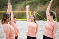 Volleyball, hands up or sports women at beach playing a game in training or fitness workout together. Team spirit, happy Royalty Free Stock Photo
