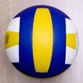 Volleyball on hardwood floor
