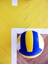 Volleyball on hardwood floor