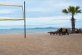 Volleyball net and beach chairs on the beach