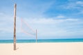 Volleyball net on empty sand beach