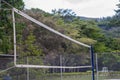 Volleyball net in the middle of a court with sticks Royalty Free Stock Photo
