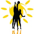 Volleyball play two girl silhouette on the sun