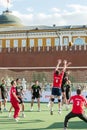 Volleyball player tries to block the ball