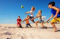 Volleyball players making a bump pass on the beach