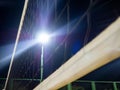 Volleyball shot close-up. Concept. Sports spotlight light. Beach volleyball court in the evening. Available infrastructure. Empty