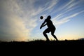 Volleyball silhouettes at sunset Royalty Free Stock Photo