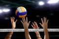 Volleyball spike hand block over the net