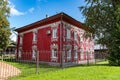 Old red wooden house with carved windows in Gogol Street, Vologda city Russia Royalty Free Stock Photo