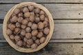 Voloshsky walnut on an old wooden background Royalty Free Stock Photo