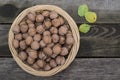 Voloshsky walnut on an old wooden background Royalty Free Stock Photo