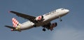 Volotea Airlines flies in the blue sky. Landing at Tenerife Airport