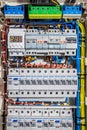 Voltage distributor with automatic switches. Electrical background.