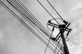 Voltage line on the sky background. Black and white filter Royalty Free Stock Photo