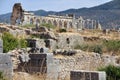 Volubilis Capitol with stones at the forefront Royalty Free Stock Photo