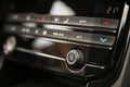 Volume control in the car media system. Royalty Free Stock Photo