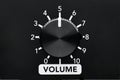 Volume control knob of a black amplifierwith dial numbers Royalty Free Stock Photo