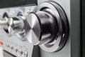 Volume control knob of home music system at selective focus Royalty Free Stock Photo