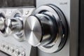 Volume control knob of home music system at selective focus Royalty Free Stock Photo