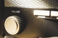 Volume wheel on an old and vintage analog radio. Close-up and detail. Copy Space Royalty Free Stock Photo