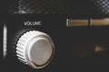 Volume wheel on an old and vintage analog radio. Close-up and detail. Copy Space Royalty Free Stock Photo