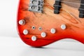 Red bass guitar volume and tone controls Royalty Free Stock Photo