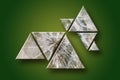 Volumetric triangles with abstract pattern on a green background