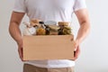 Volunteer with box of food for poor. Donation concept Royalty Free Stock Photo