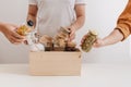 Volunteer with box of food for poor. Donation concept Royalty Free Stock Photo