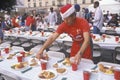 Volunteer at Christmas dinner for the homeless Royalty Free Stock Photo