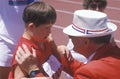 Volunteer coaching handicapped young athlete