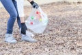 Volunteer collecting polyethylene terephthalate bottle garbage in park for recycle, Volunteer and Save Environmental concept Royalty Free Stock Photo