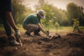 Volunteer, farmer plant for gardening in park with trees in nature environment. Happy team helping and planting for growth,