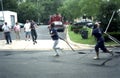 Volunteer firefighters pulling hose lines