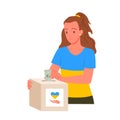 Volunteer girl in shirt in national colors of Ukraine putting money into charity box
