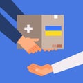 volunteer giving help box with Ukrainian flag to refugee humanitarian aid material assistance governmental help