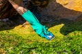 Volunteer hands cleaning oil on Rio Vermelho beach after spillage from a ship off the Brazilian coast