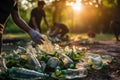 Volunteer help collect trash into black garbage bags at various locations on the occasion of World Environment Day.by