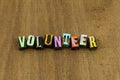 Volunteer handbook help others teamwork charity kind kindness donate Royalty Free Stock Photo